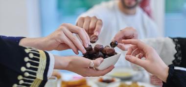 Muslim family having iftar together during Ramadan.