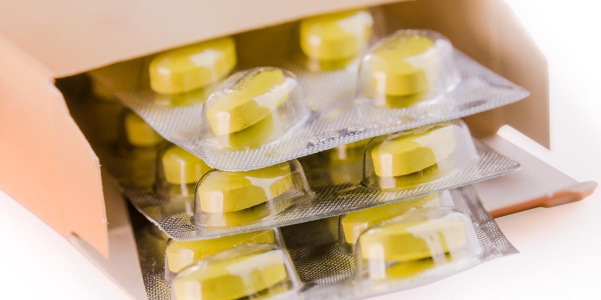 A packet of yellow pills. 