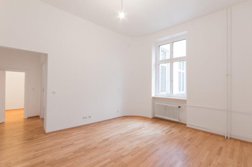 An empty flat with wood floors